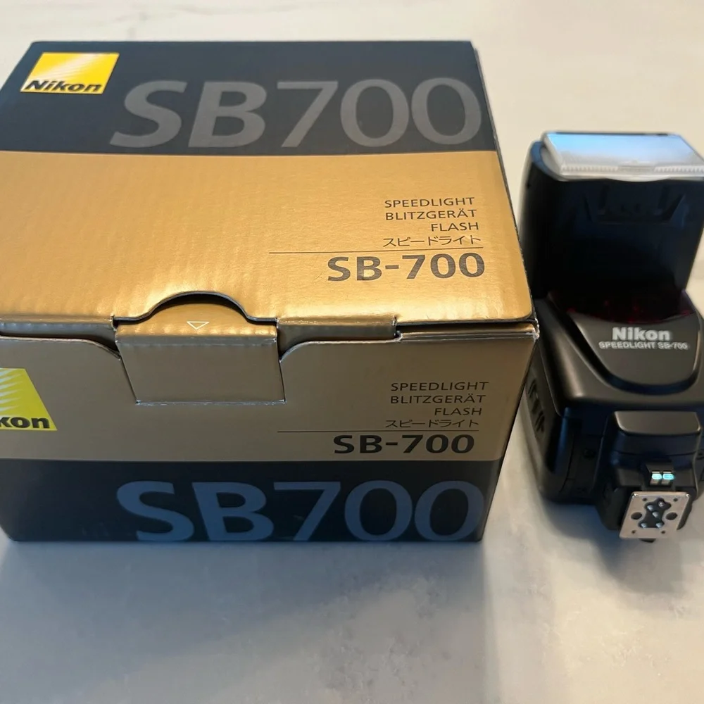 Nikon D7100 camera, 4 lenses, Flash, battery, charger and Wi-FI connector